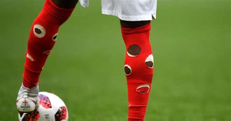 football socks with holes